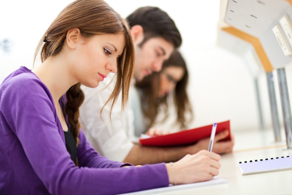 Young students studying in a library